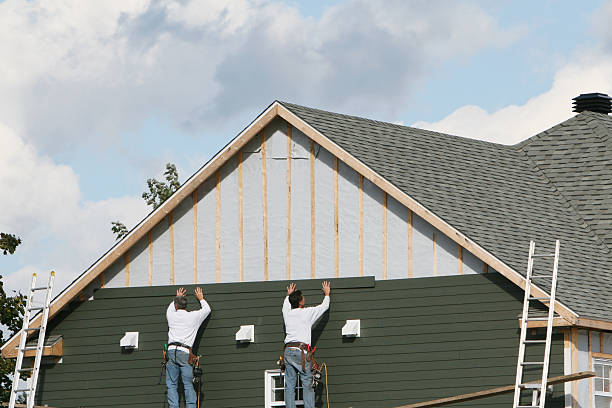 Professional Siding Replacement technician working in Wayland, MA